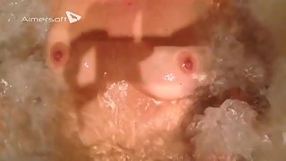 Boobs in the jacuzzi bath seeing breasts bounce and massaged by water