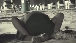 Amateur spycam orgy video in public on the beach at night