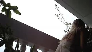 Super marvelous upskirt woman gets filmed at the balcony on the hidden camera